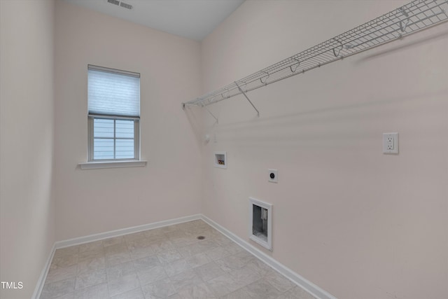 washroom with visible vents, baseboards, laundry area, hookup for a washing machine, and hookup for an electric dryer