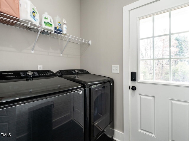 laundry area featuring laundry area and separate washer and dryer