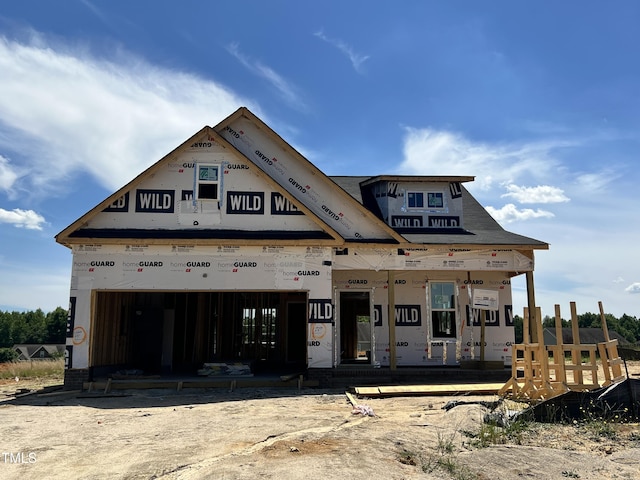 unfinished property with a garage