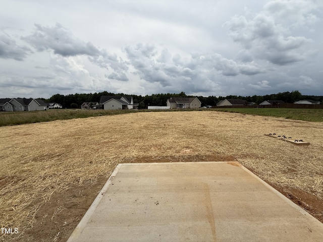 394 Springtooth Dr, Zebulon, NC 27597 - view of yard with a patio and a residential view
