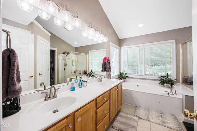 full bathroom with a shower stall, vaulted ceiling, and a sink