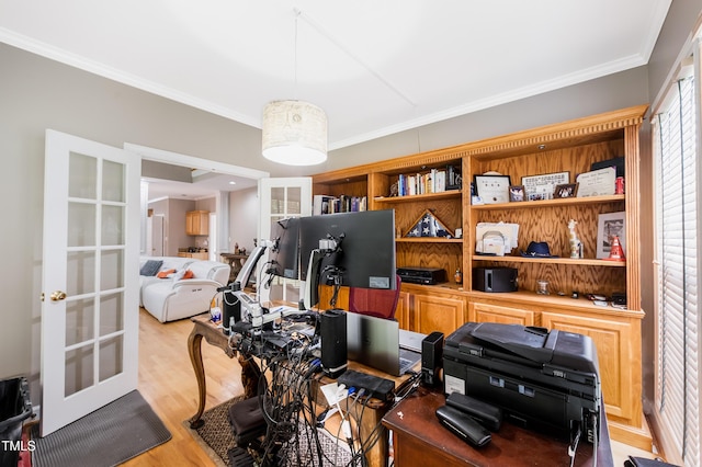 office area featuring ornamental molding, light wood-type flooring, and french doors