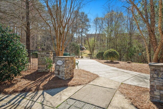 view of patio featuring a gate