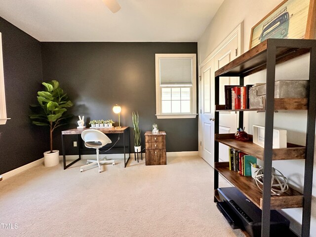 home office featuring baseboards and carpet floors