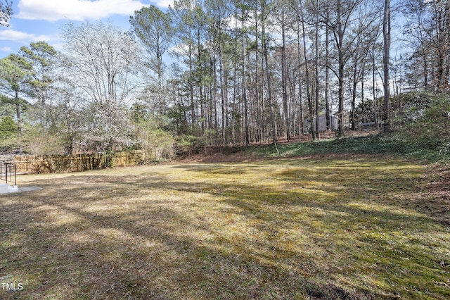 view of yard with fence