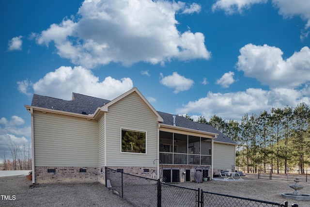 5204 Sandbridge Rd, Bailey, NC 27807 - rear view of house with crawl space, a sunroom, a fenced backyard, and a shingled roof