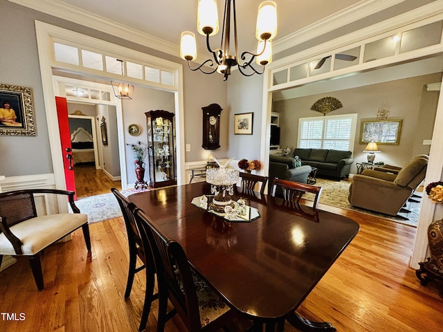 5204 Sandbridge Rd, Bailey, NC 27807 - dining space featuring a chandelier, light wood-type flooring, and ornamental molding