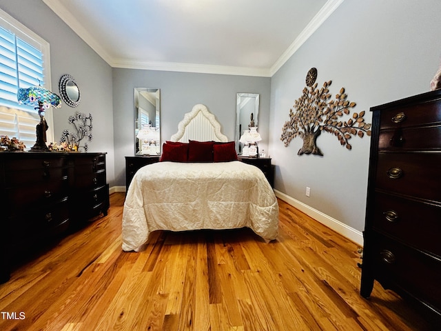 5204 Sandbridge Rd, Bailey, NC 27807 - bedroom with light wood-style floors, ornamental molding, and baseboards