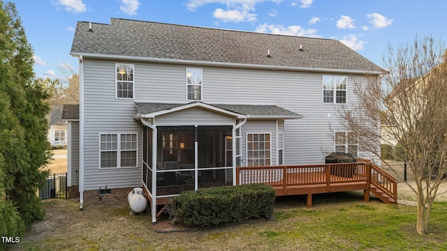 back of house with a yard, a shingled roof, a sunroom, crawl space, and a deck