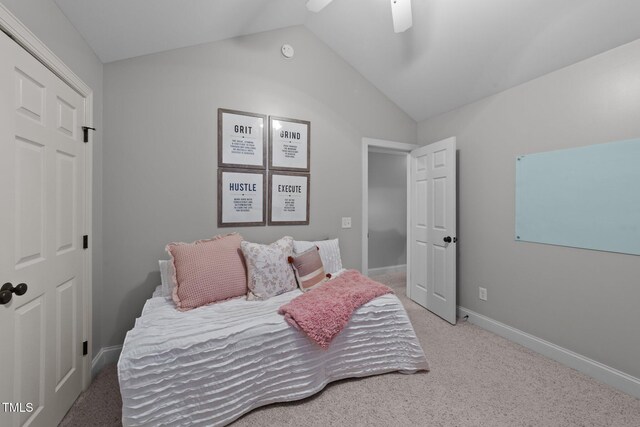 bedroom with lofted ceiling, carpet flooring, a ceiling fan, and baseboards