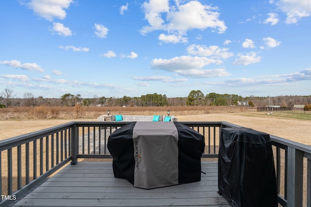 wooden terrace with area for grilling