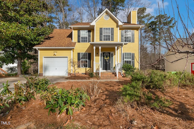 view of front of house featuring concrete driveway, a chimney, a garage, and roof with shingles