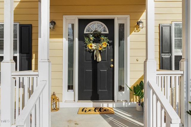 doorway to property with a porch