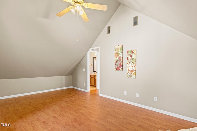 bonus room with visible vents, light wood-style flooring, and baseboards