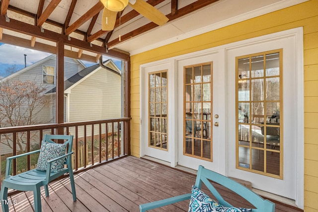 wooden terrace with french doors and ceiling fan