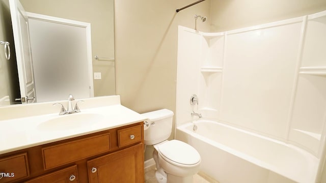 bathroom with vanity, toilet, and shower / bathtub combination