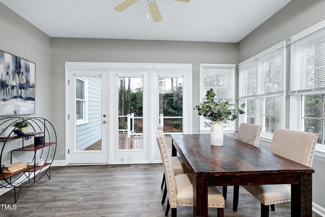 sunroom featuring a ceiling fan