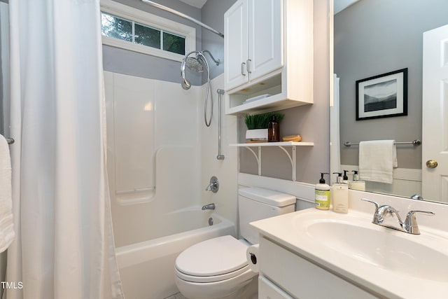 full bathroom featuring shower / bathtub combination with curtain, vanity, and toilet