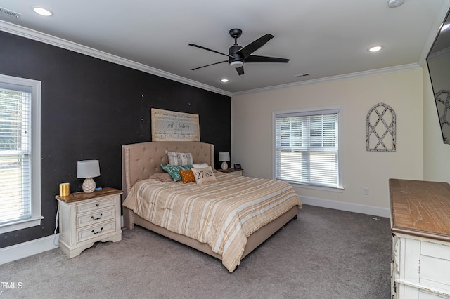 bedroom featuring multiple windows, baseboards, and crown molding