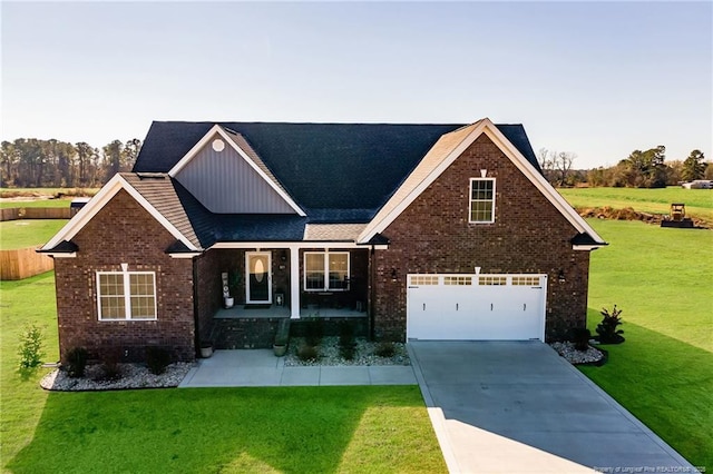 view of front of house with concrete driveway, covered porch, a front yard, board and batten siding, and brick siding