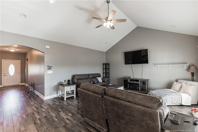 living room featuring arched walkways, ceiling fan, lofted ceiling, baseboards, and dark wood-style floors