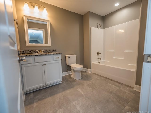 full bath with bathtub / shower combination, vanity, toilet, and baseboards