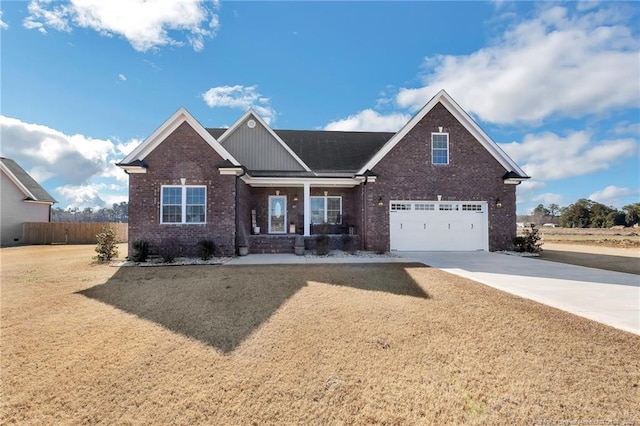 view of front facade featuring a garage, concrete driveway, brick siding, and fence