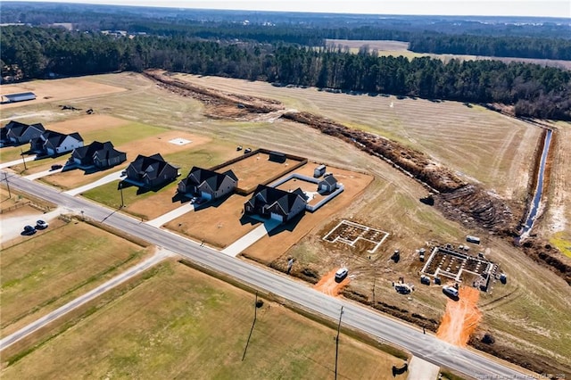 aerial view with a view of trees and a rural view