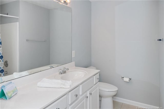 full bath with baseboards, a shower, toilet, tile patterned floors, and vanity