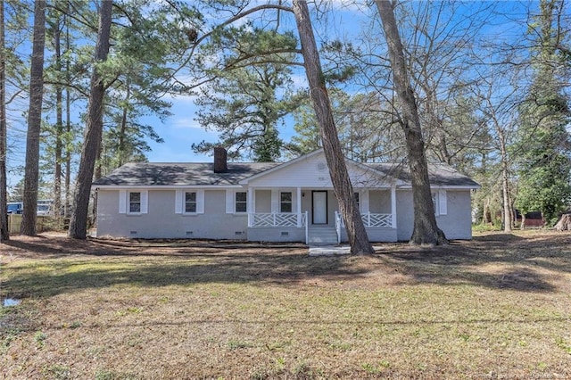 ranch-style house featuring a porch, crawl space, a chimney, and a front lawn