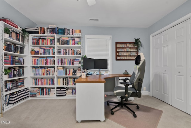 office area featuring carpet floors and visible vents