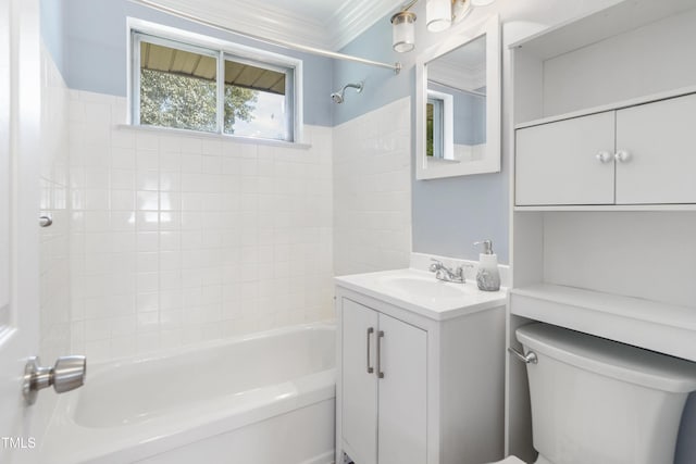 full bath featuring toilet, washtub / shower combination, ornamental molding, and vanity