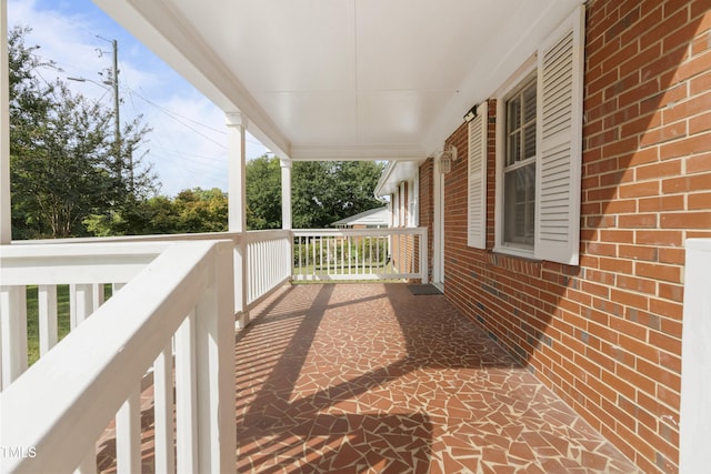 wooden deck with a porch