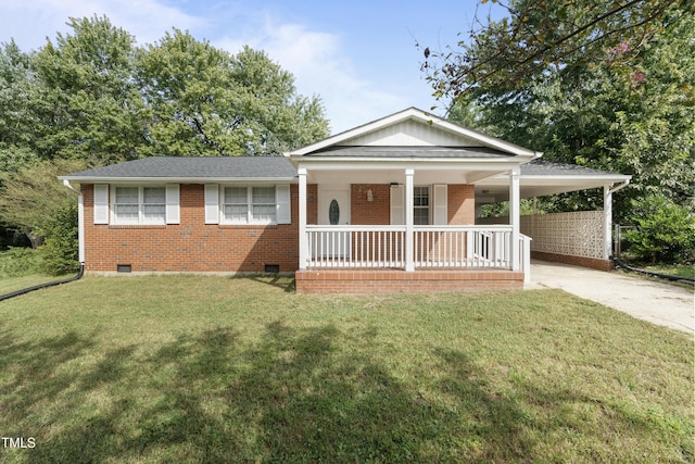 view of front facade featuring brick siding, concrete driveway, crawl space, covered porch, and a front yard