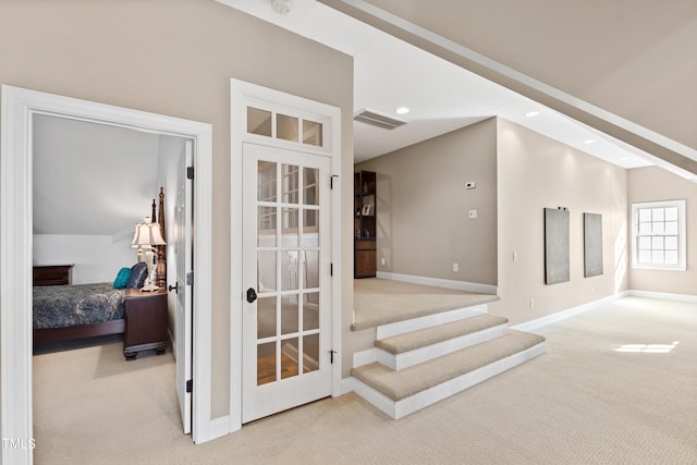 hall featuring carpet, visible vents, baseboards, and recessed lighting