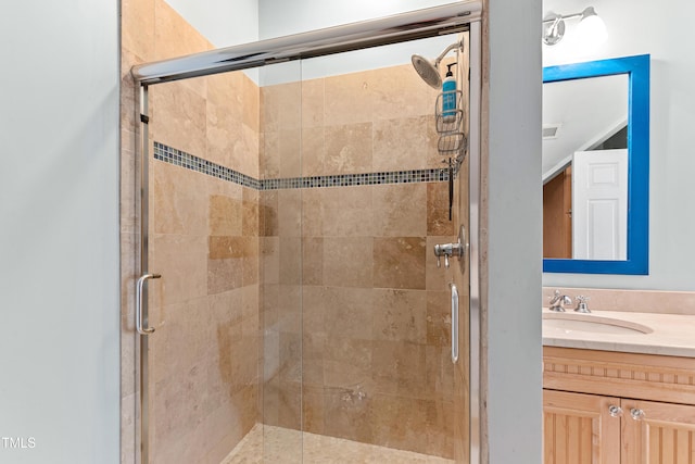 bathroom featuring a stall shower, visible vents, and vanity