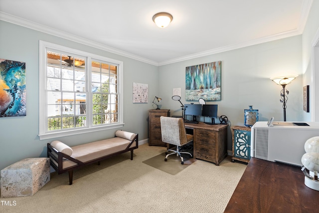 carpeted office with baseboards and crown molding