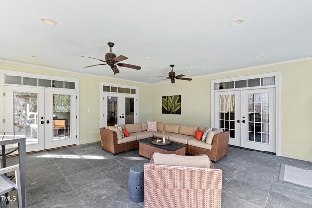 living room with recessed lighting, baseboards, crown molding, and french doors