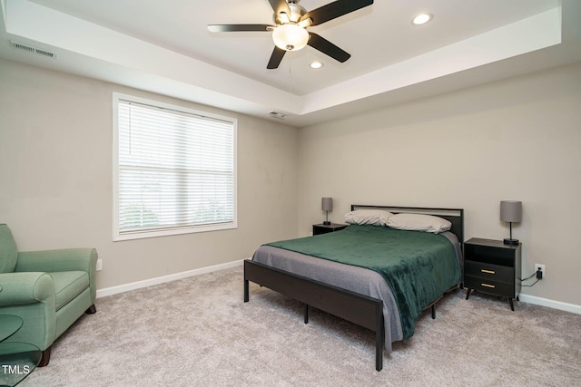 bedroom featuring recessed lighting, light carpet, visible vents, and baseboards