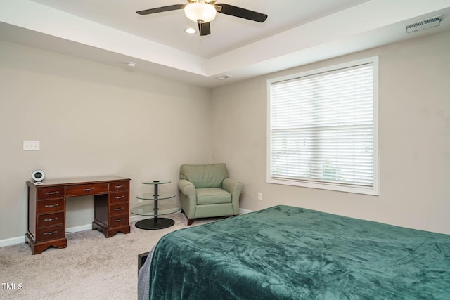 bedroom with light carpet, baseboards, multiple windows, and visible vents