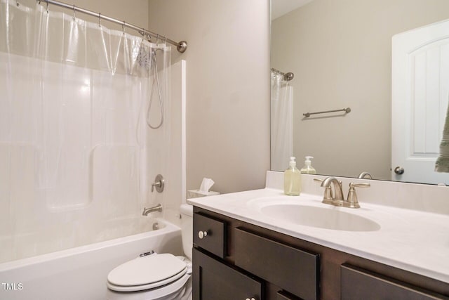 full bath featuring vanity, toilet, and shower / bath combo with shower curtain