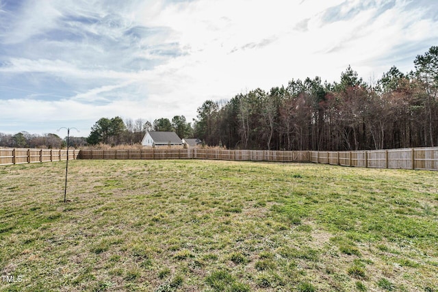 view of yard with fence