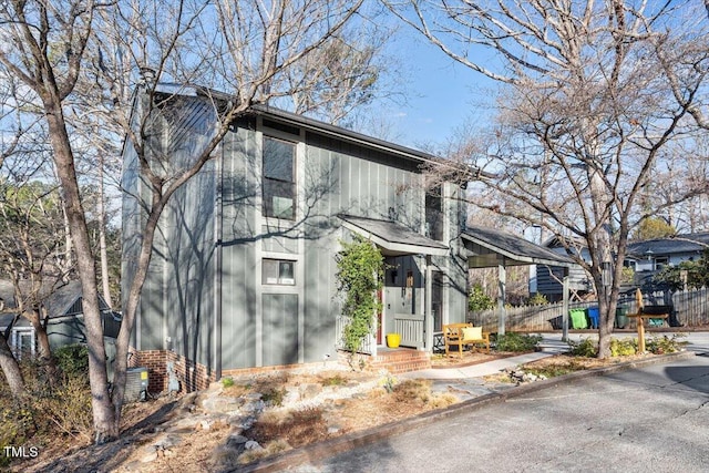 view of front of home with fence