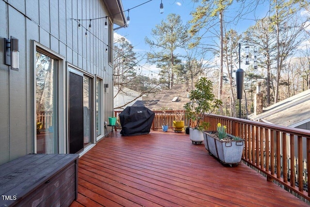 deck featuring a grill