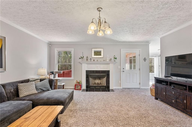 living room with a fireplace, ornamental molding, carpet flooring, a textured ceiling, and baseboards