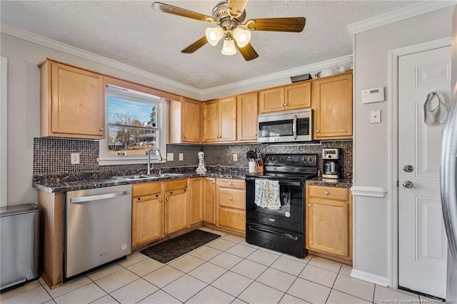 kitchen with ornamental molding, stainless steel appliances, a sink, and light tile patterned flooring