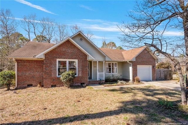 ranch-style home featuring an attached garage, brick siding, fence, crawl space, and a front yard