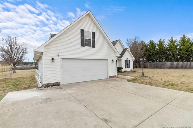 view of front of property featuring a garage, fence, concrete driveway, and a front yard