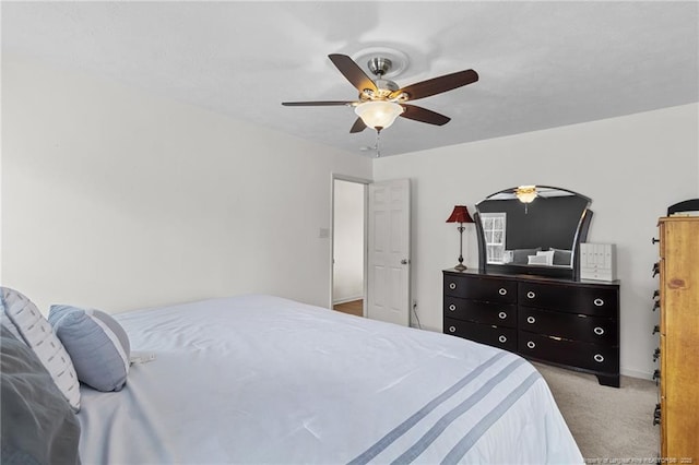 bedroom featuring carpet and a ceiling fan