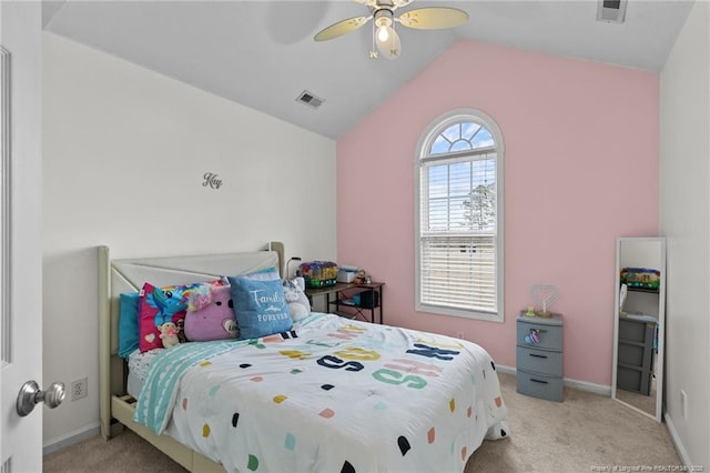 bedroom with lofted ceiling, baseboards, visible vents, and light colored carpet